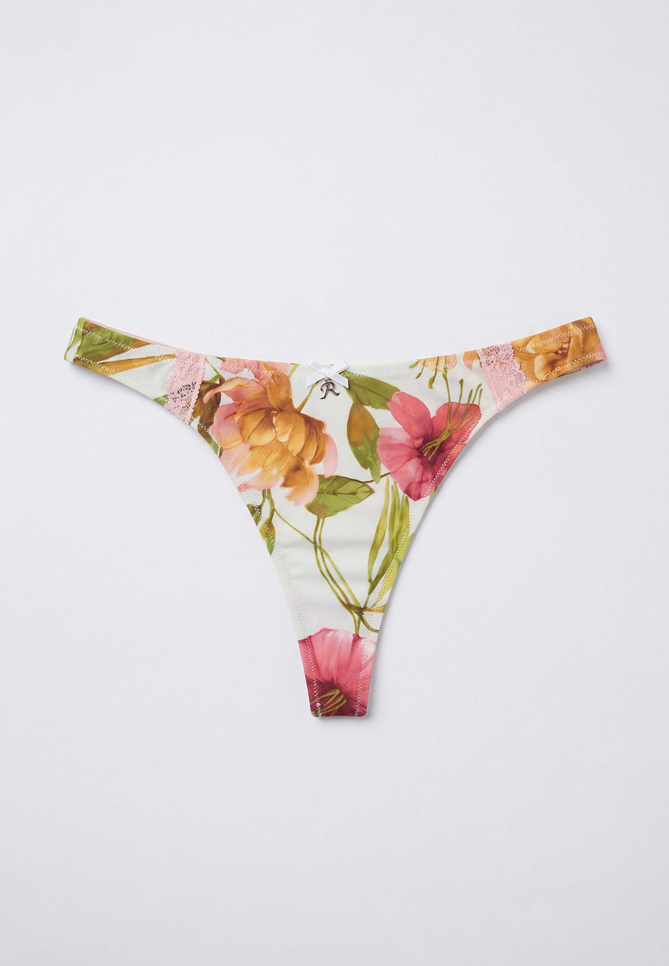 String ivoire à imprimé floral tropical avec fleurs roses et orangées et nœud décoratif